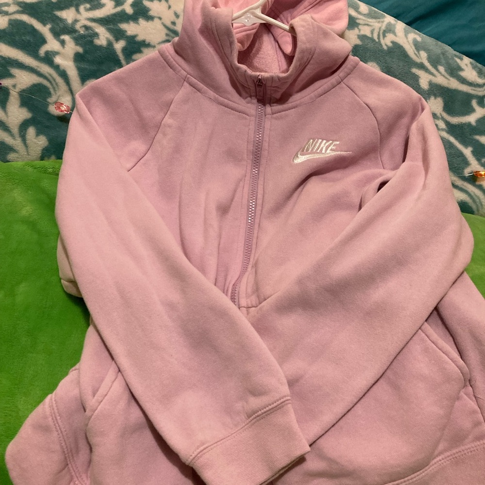 Nike women’s sweatshirts. Pink is zip up and blue is pull over. Size medium